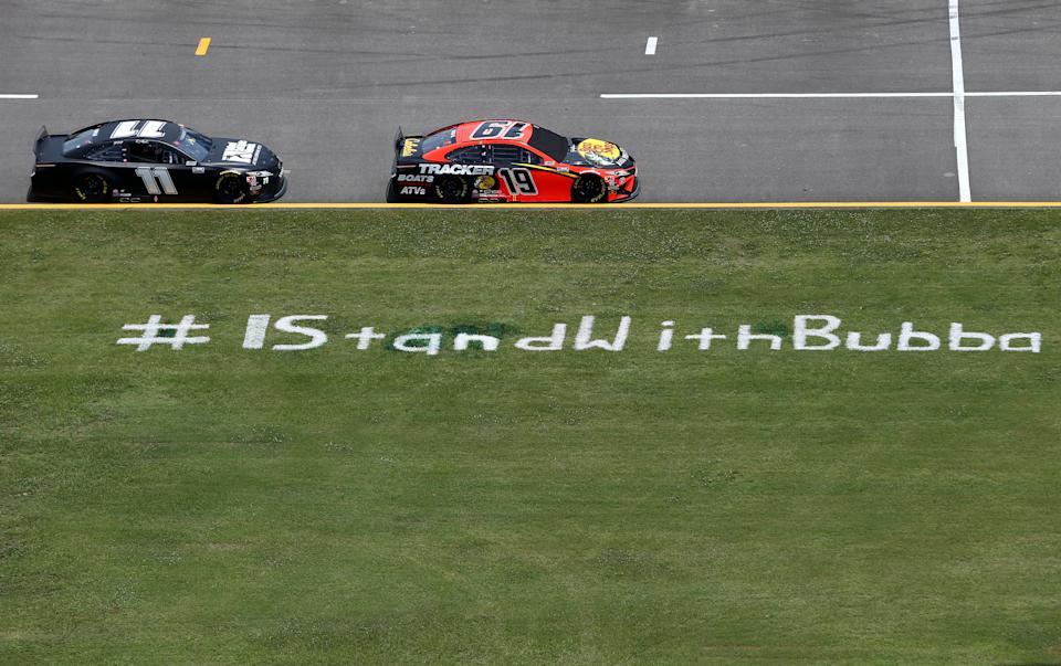TALLADEGA, ALABAMA - JUNE 22: A view of pit road is seen with an #IStandWithBubba stencil prior to the NASCAR Cup Series GEICO 500 at Talladega Superspeedway on June 22, 2020 in Talladega, Alabama. A noose was found in the garage stall of NASCAR driver Bubba Wallace at Talladega Superspeedway a week after the organization banned the Confederate flag at its facilities. (Photo by Brian Lawdermilk/Getty Images)